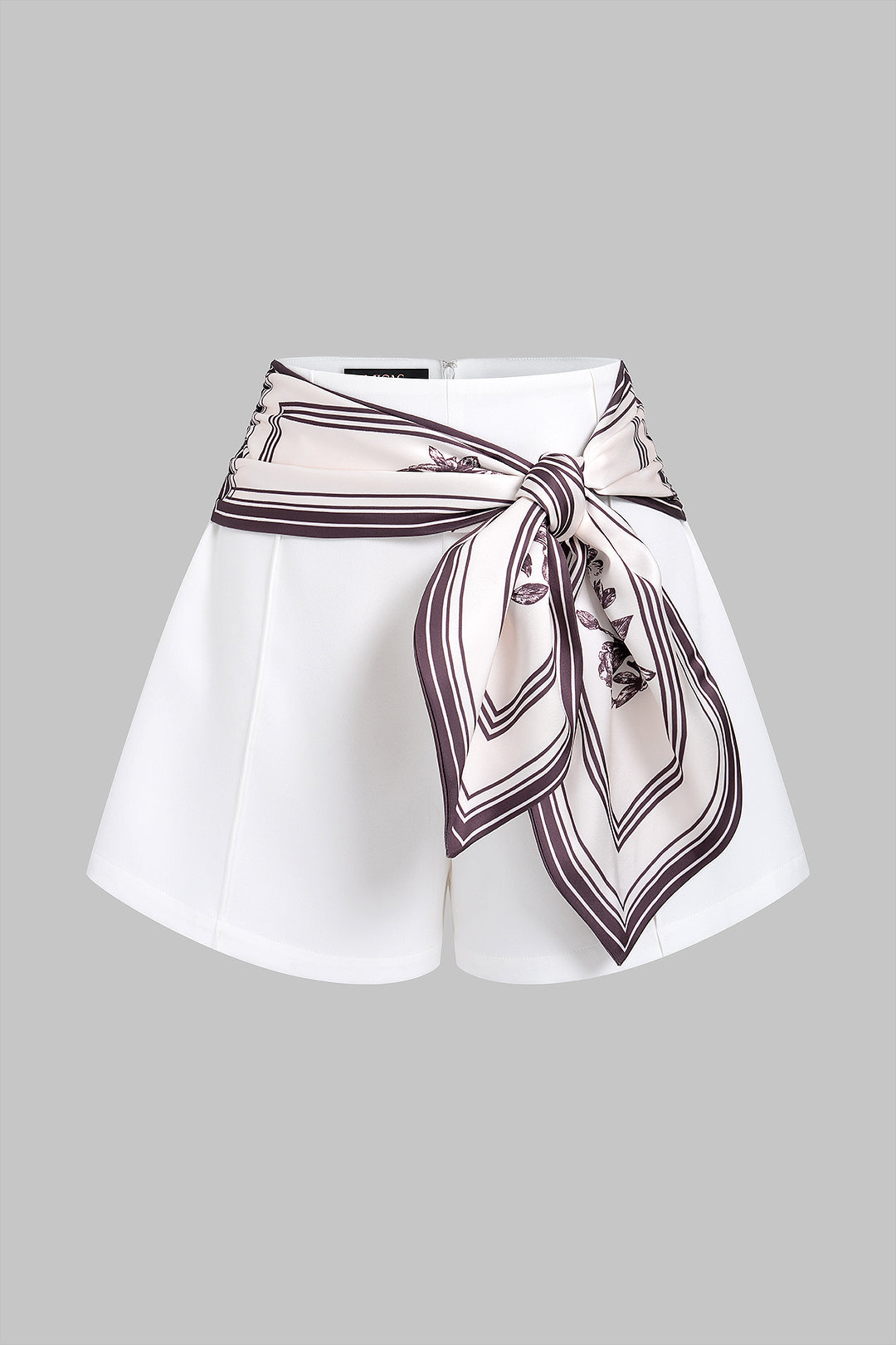 Geometrische short met strik en wijde pijpen