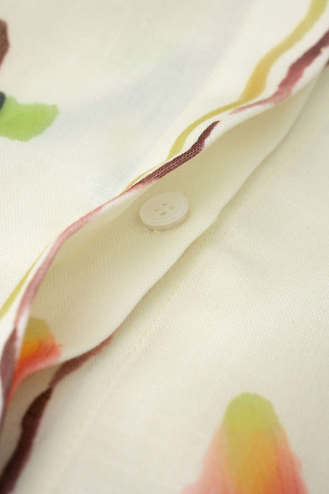 Midijurk met knoopjes, zakken en riem