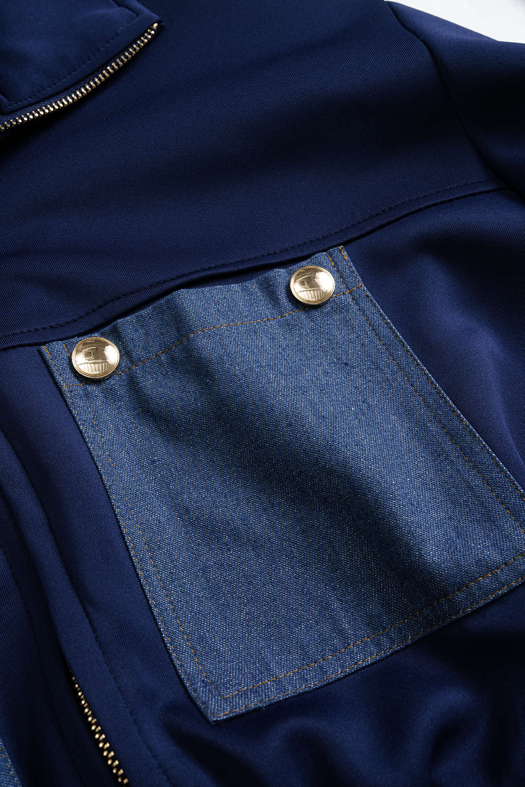 Denim patchwork jasje met smokwerk en rits