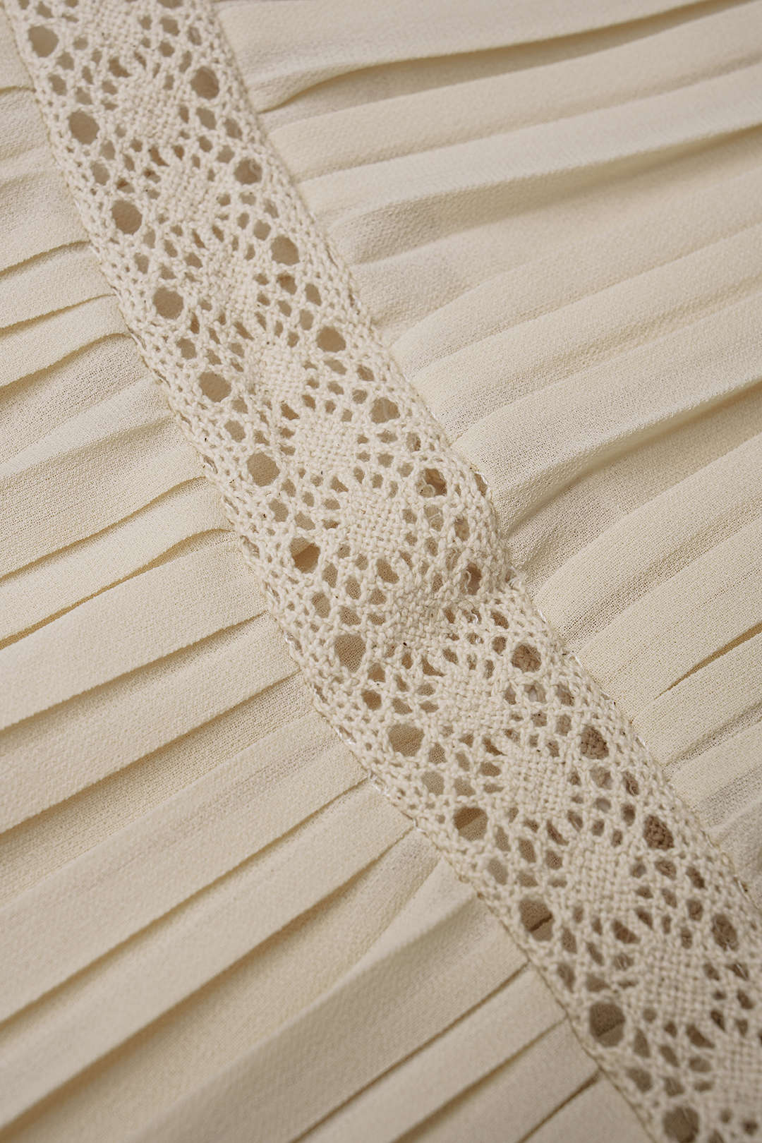 Chiffon asymmetrische top met V-hals en strik