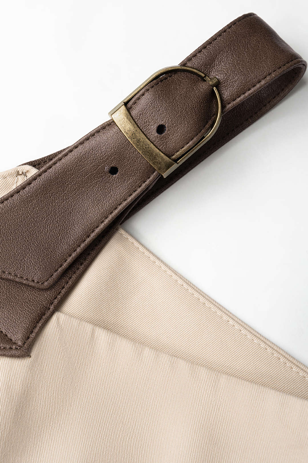 Leren-look patchwork gilet met knoopdetail