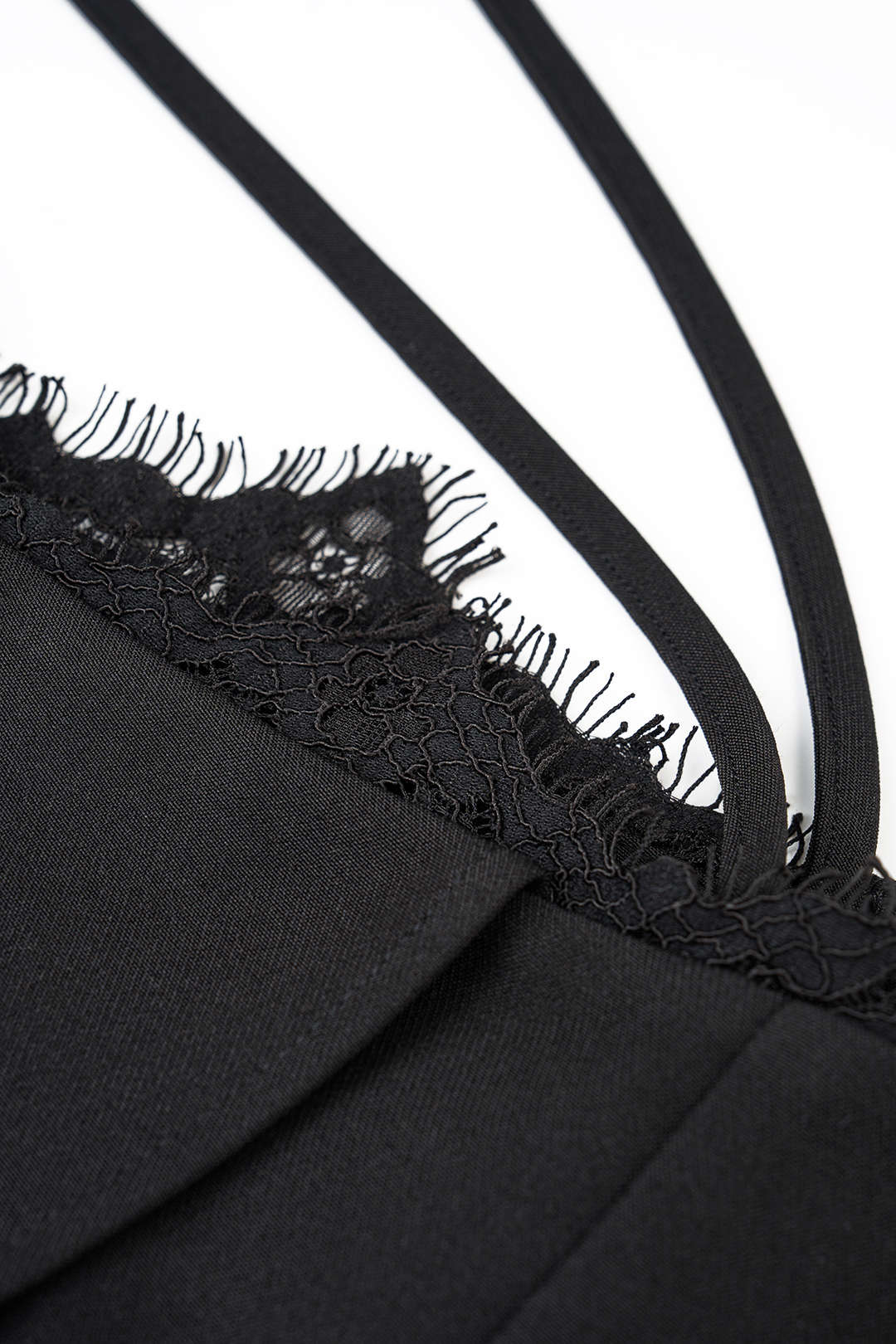 Asymmetrische broek met kanten rand en wijde pijpen