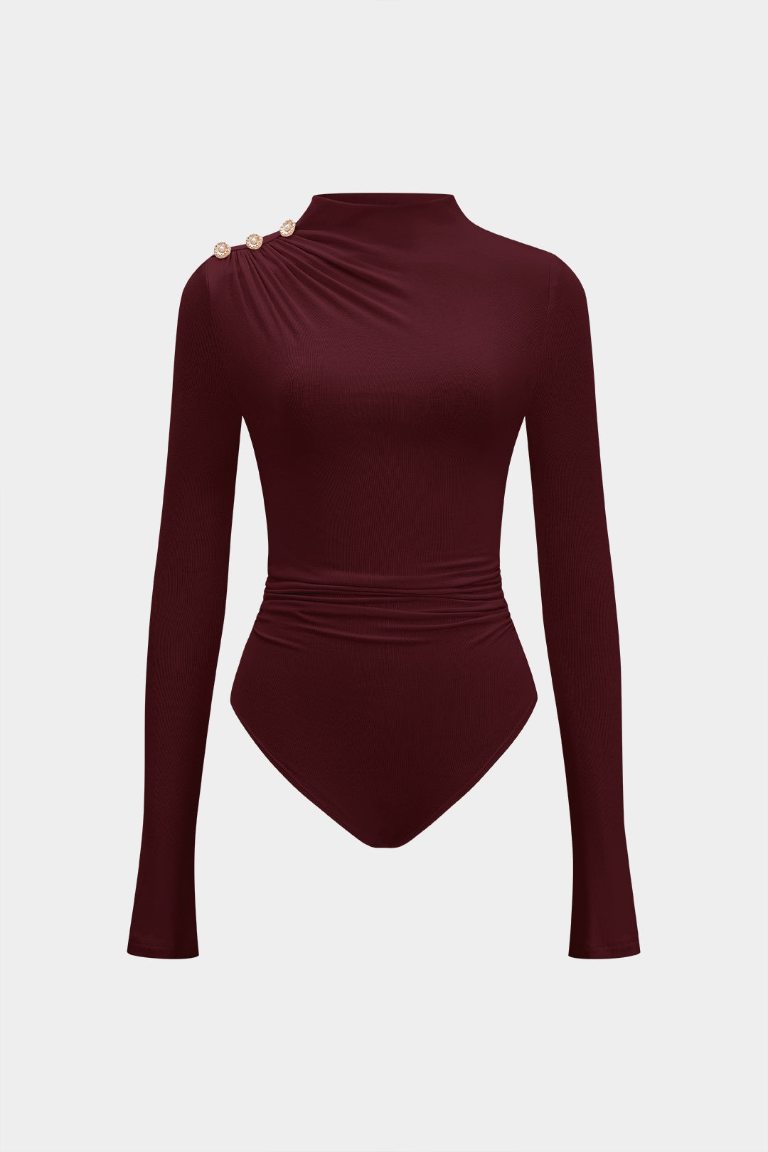 Asymmetrische body met knoopjes, ruches en lange mouwen