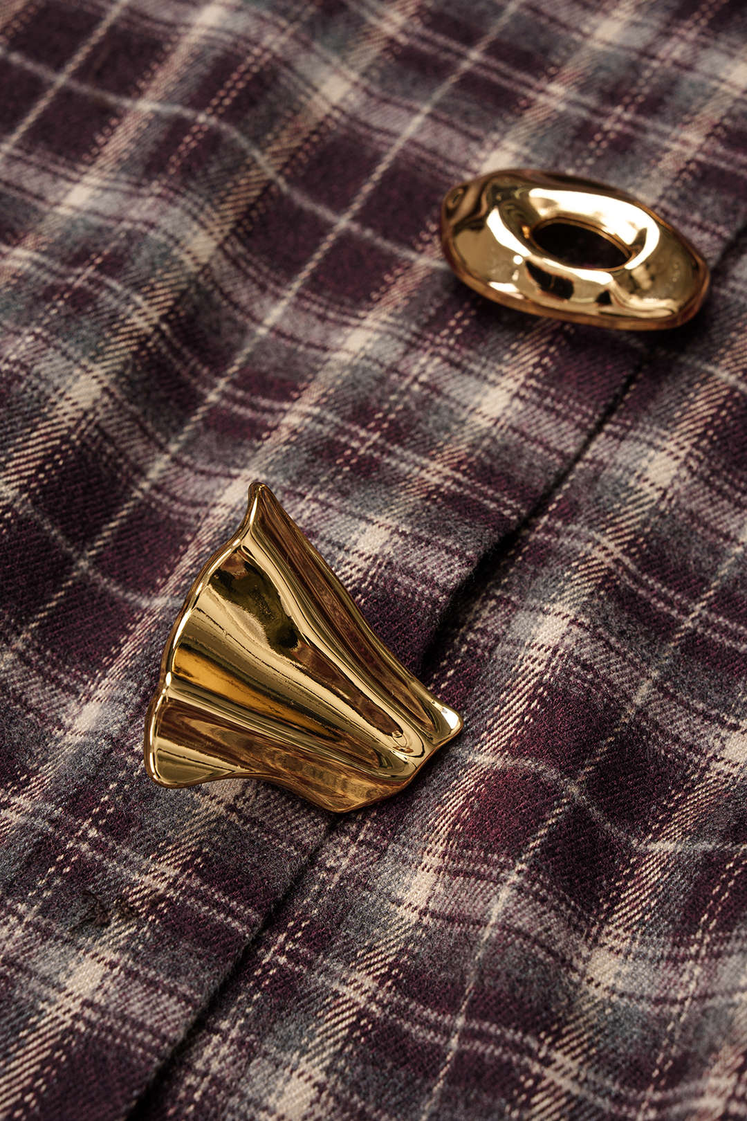 Geruite metallic blouse met knoopjes, strik en lange mouwen