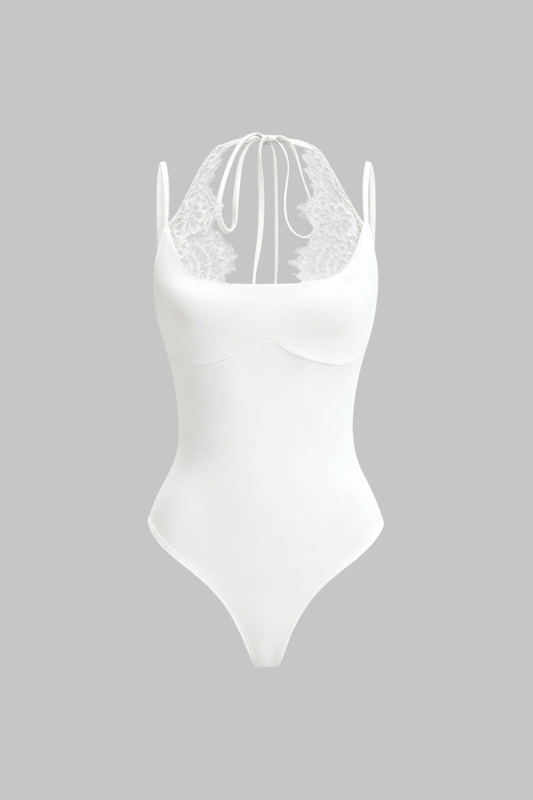 Patchwork mouwloze body met kant en strik
