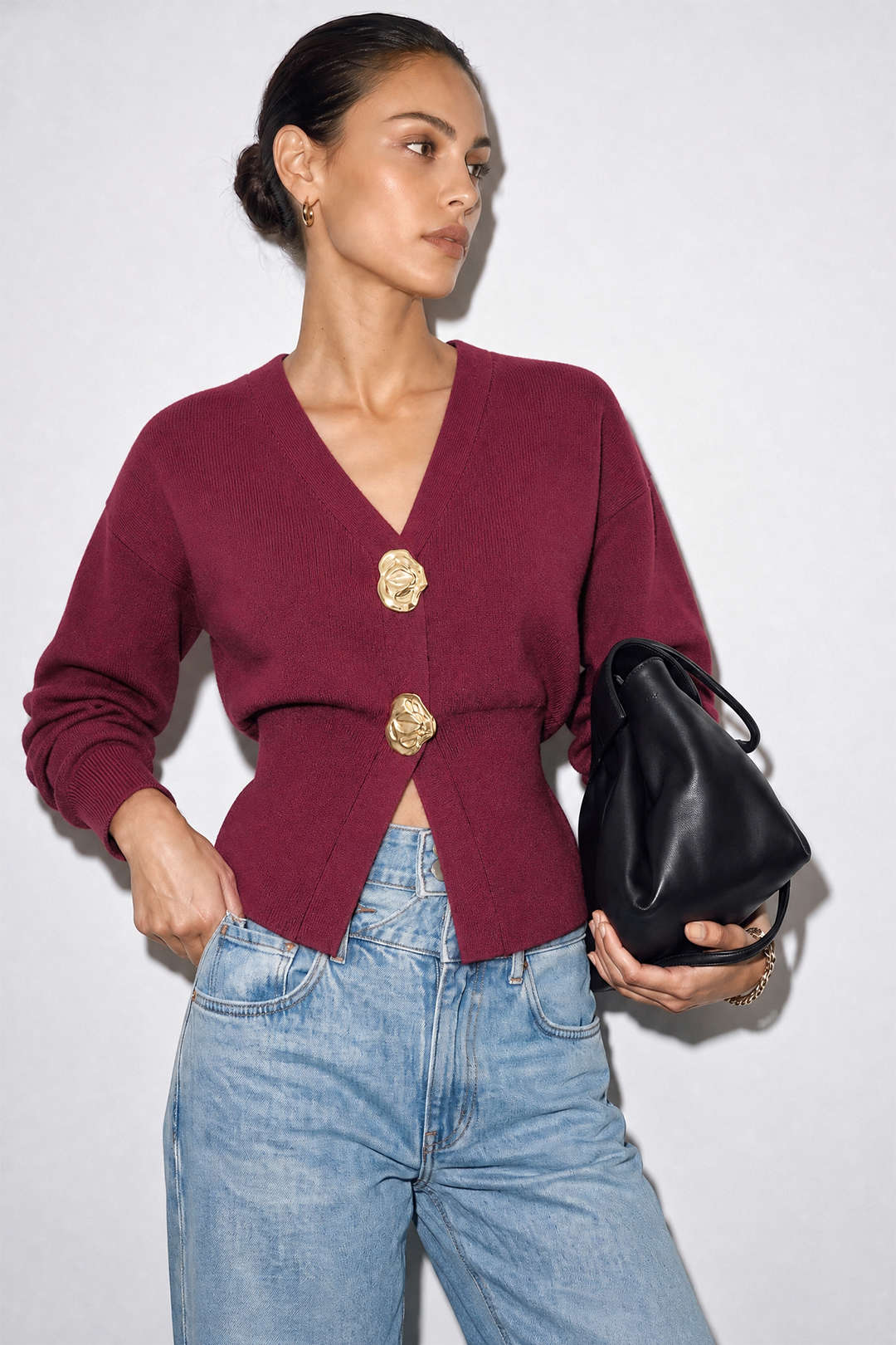 Gebreid metallic vest met knoopjes en lange mouwen