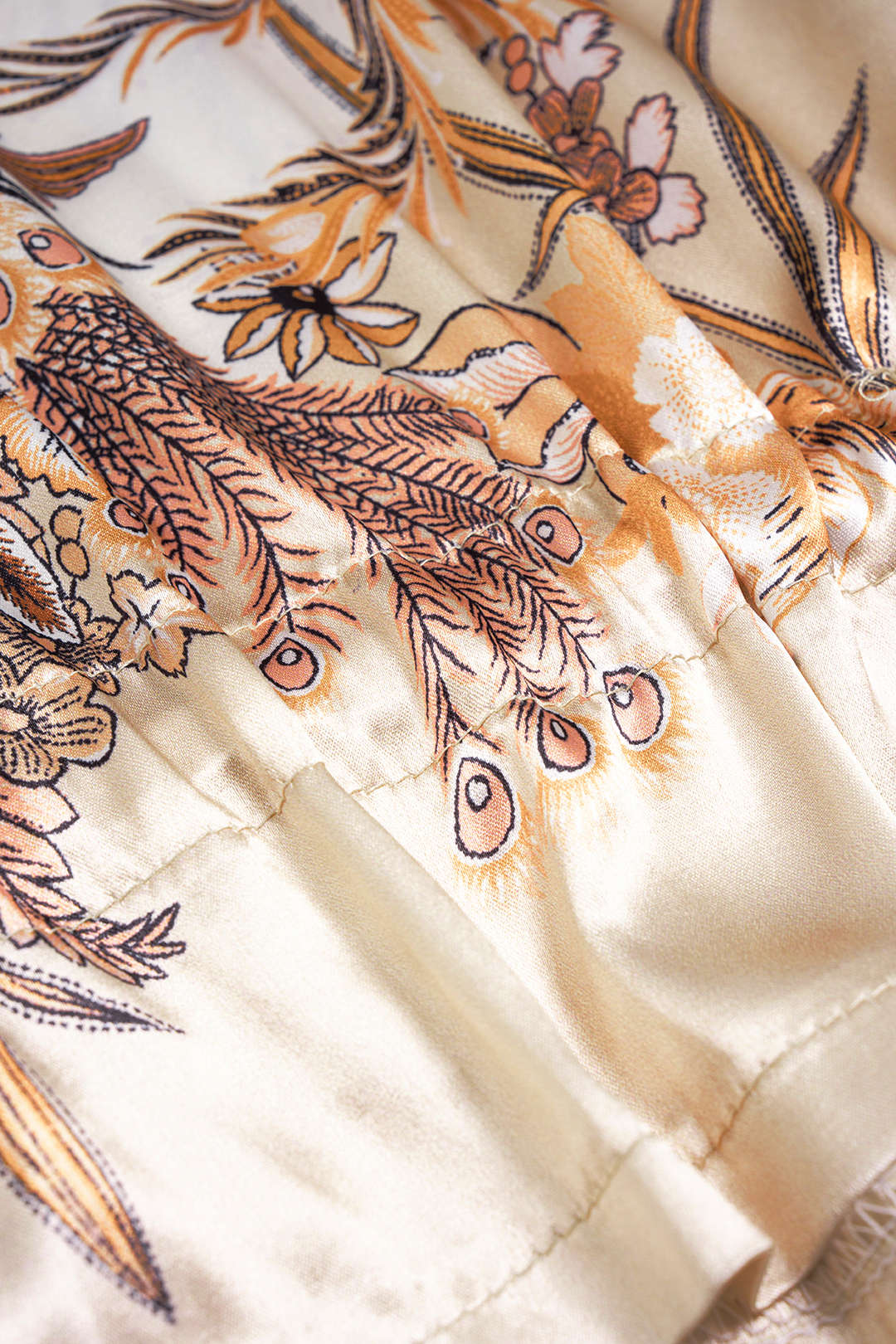 Bloemenprint satijnen blouse met trekkoord en lange mouwen