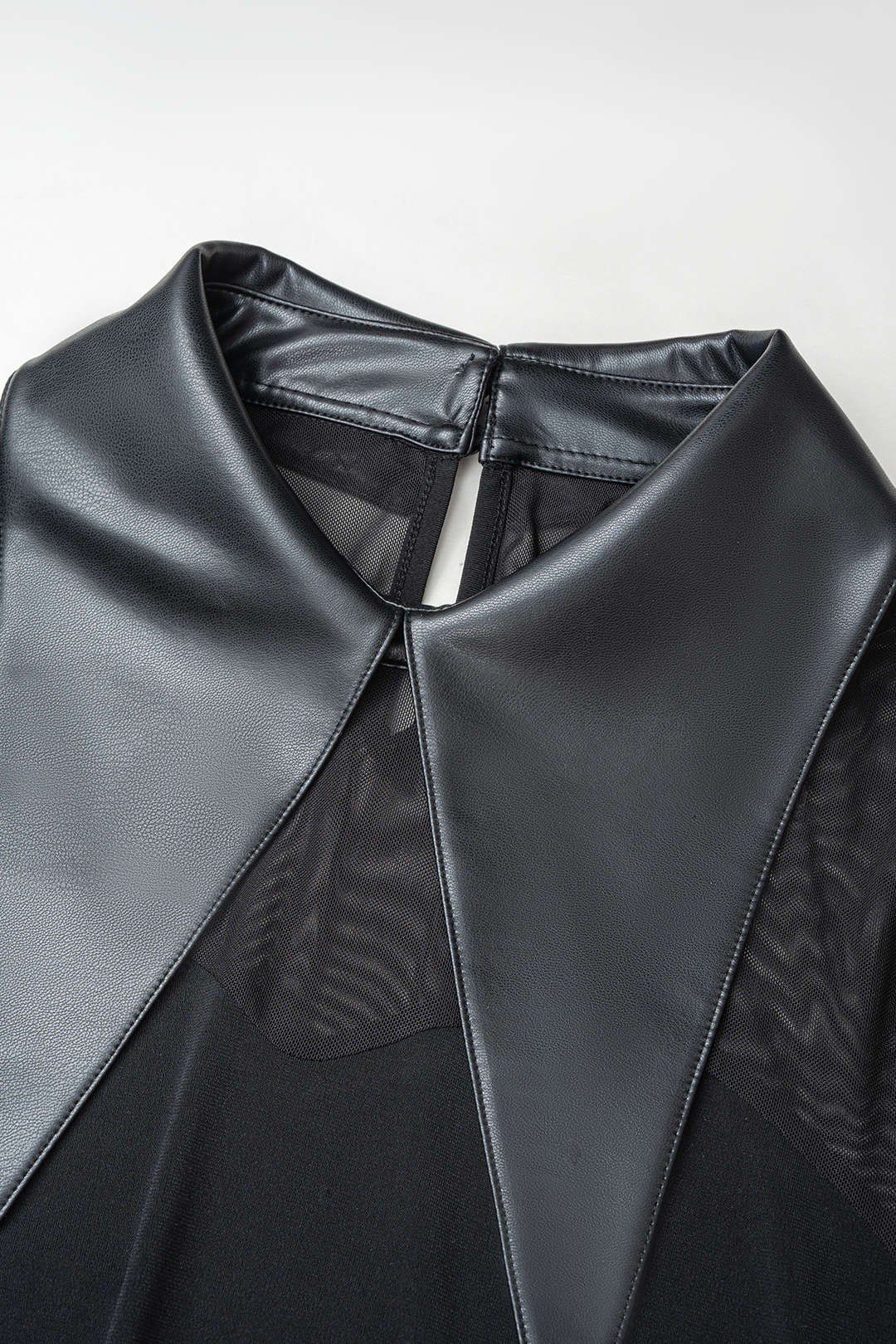 Mesh patchwork body met ronde hals en lange mouwen