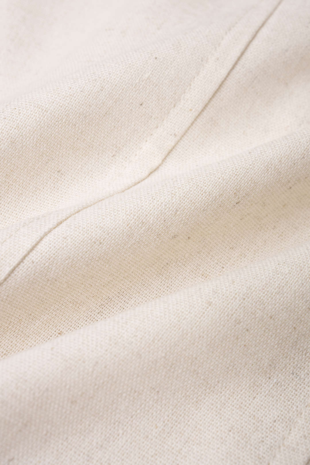 Metallic mouwloze minijurk met dubbele knopenrij