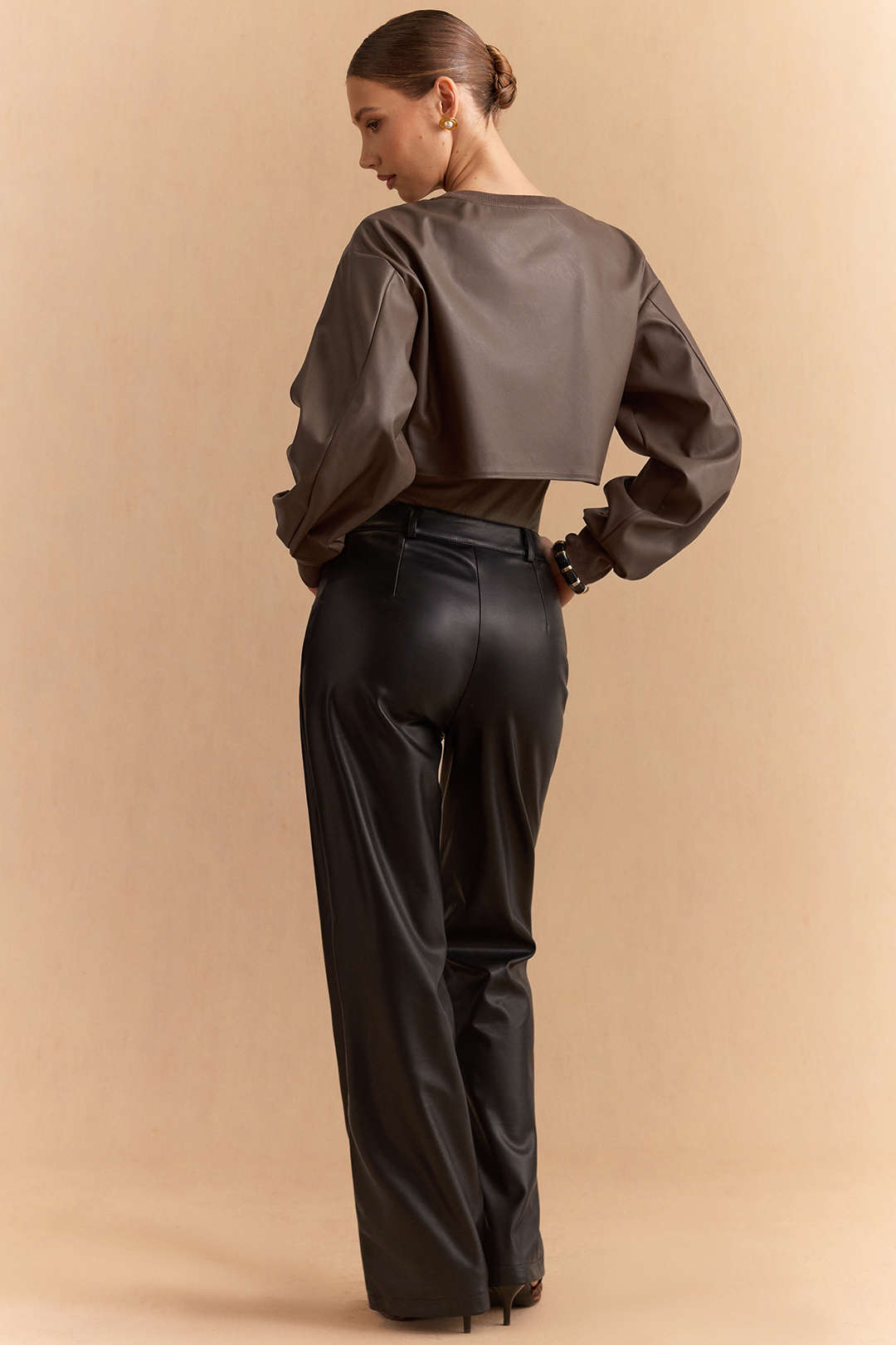 Hailey - Leren-look patchwork body met ronde hals en lange mouwen
