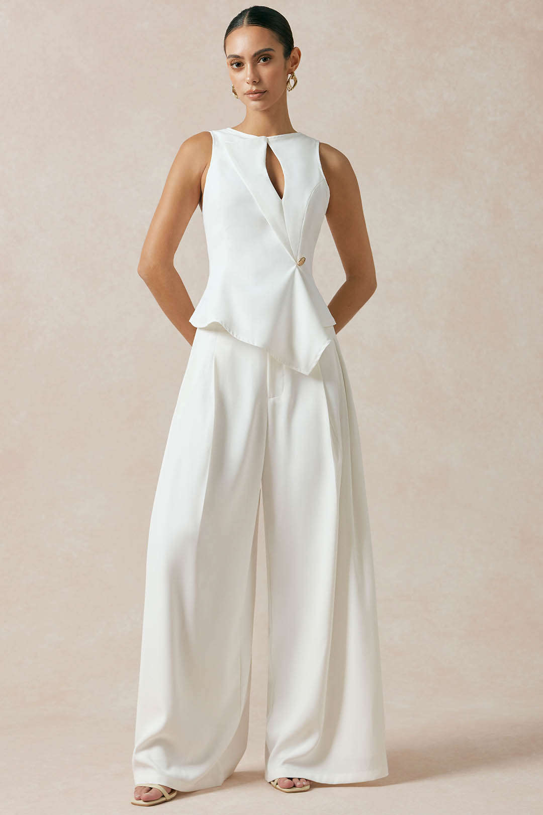 Asymmetrische tanktop met uitsnijding en knoopjes