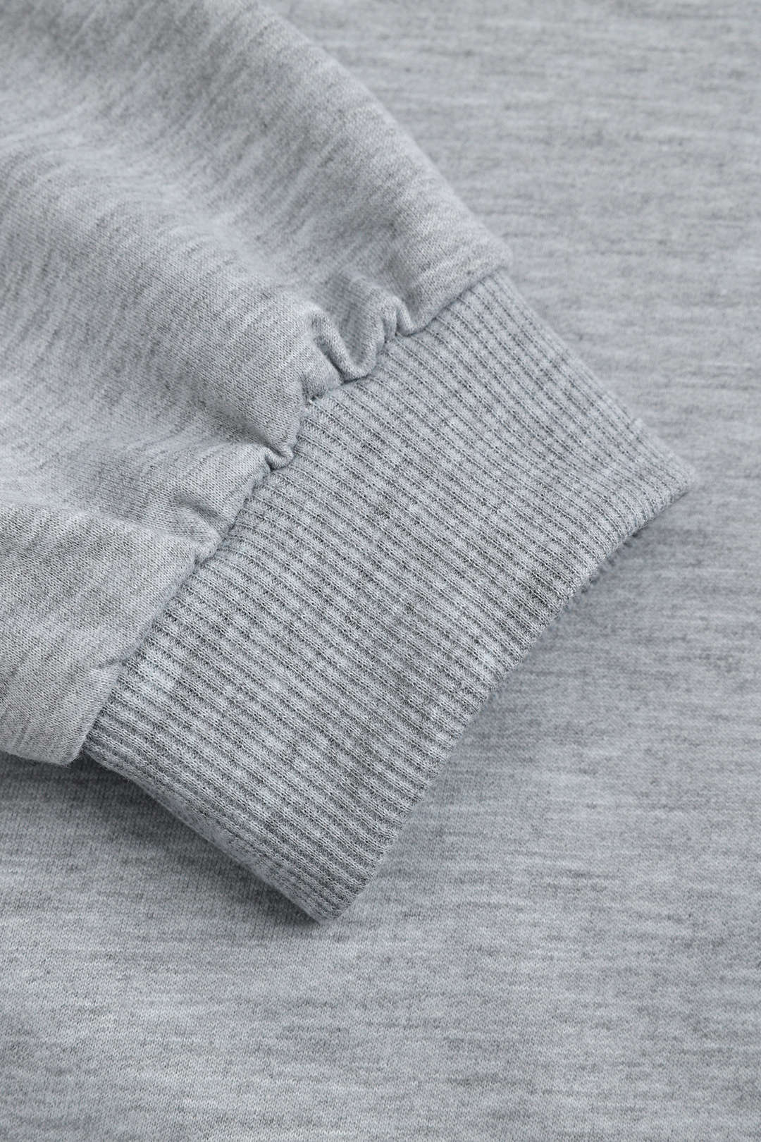 Top met uitsnijding, open rug en lange mouwen