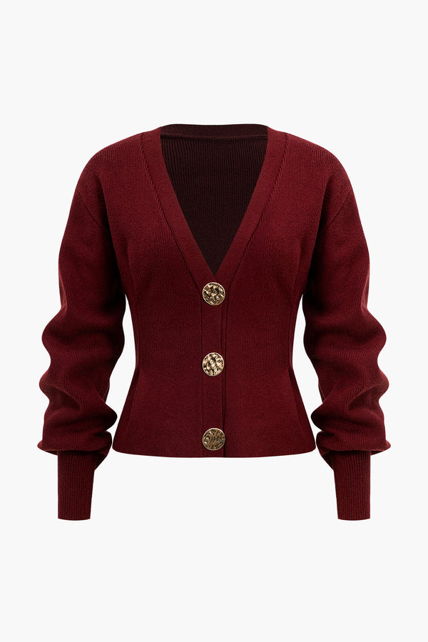 Gebreid vest met knoopjes en V-hals