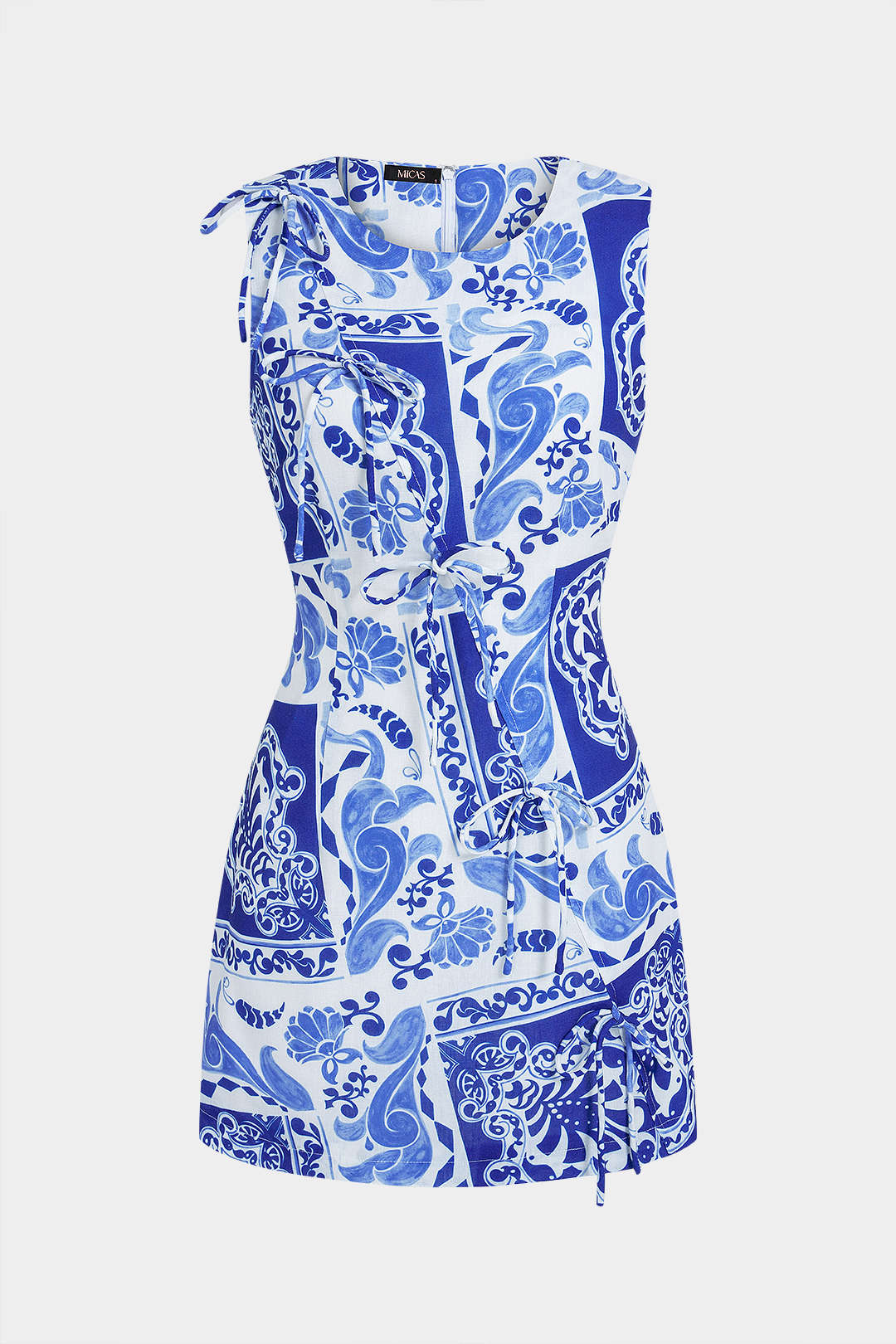 Bloemenprint mouwloze minijurk met ronde hals en knoopdetail
