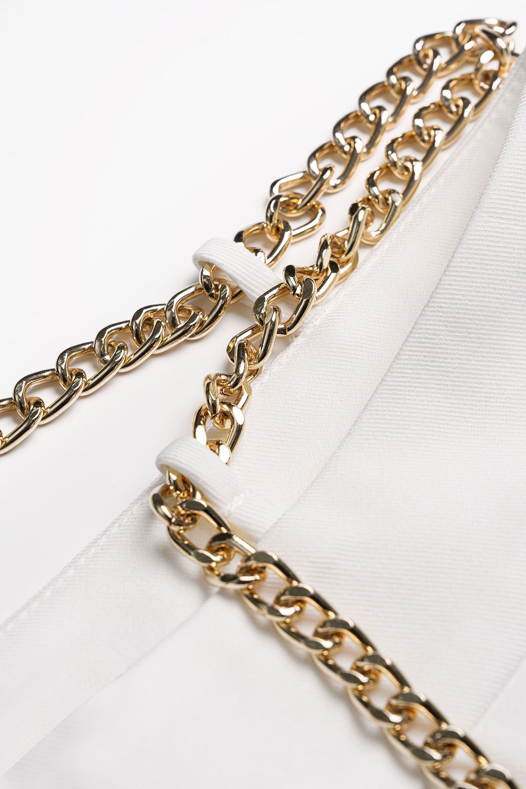 Metallic broek met kettingdetail en wijde pijpen