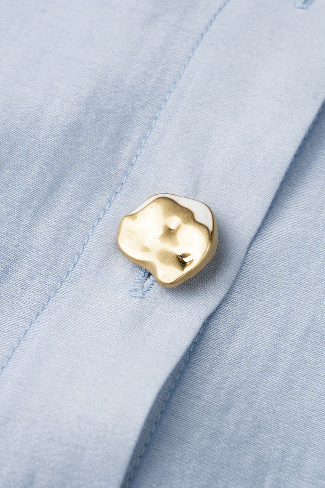 Greta - Metallic blouse met knoopjes en lange mouwen