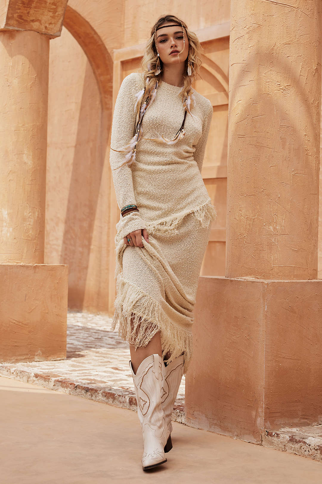 Effen asymmetrische top met franjes en lange mouwen