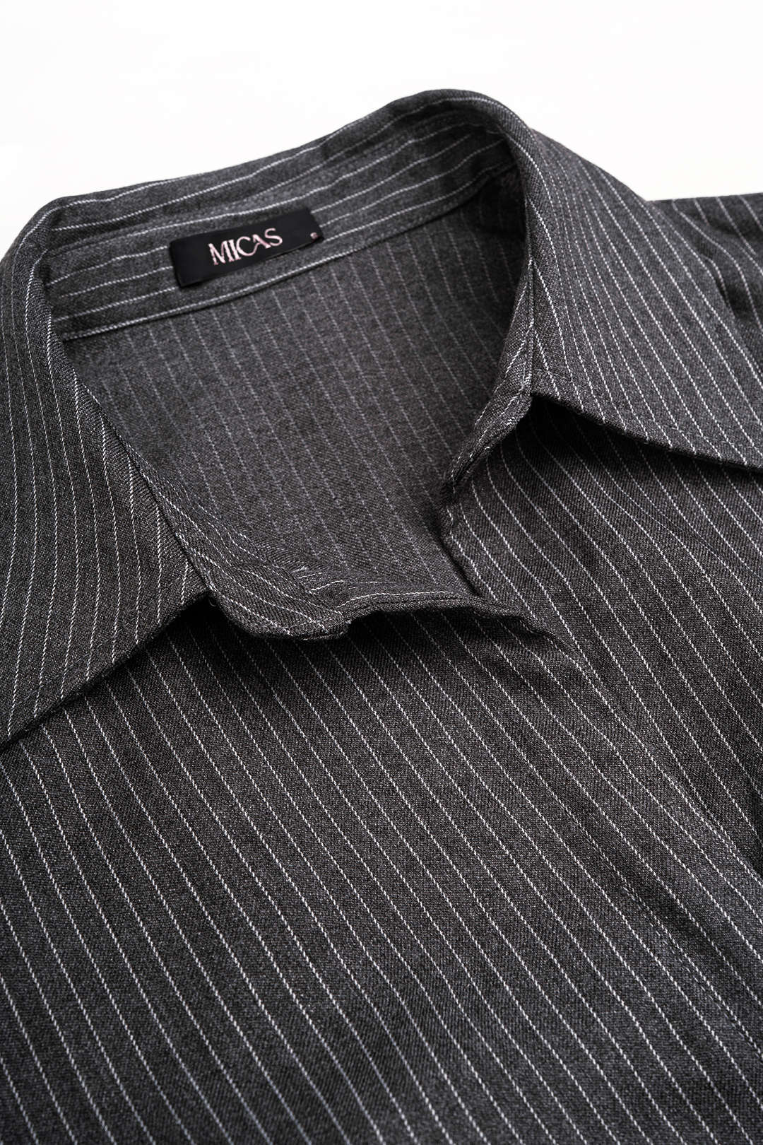 Metallic asymmetrische midijurk met V-hals en ruches