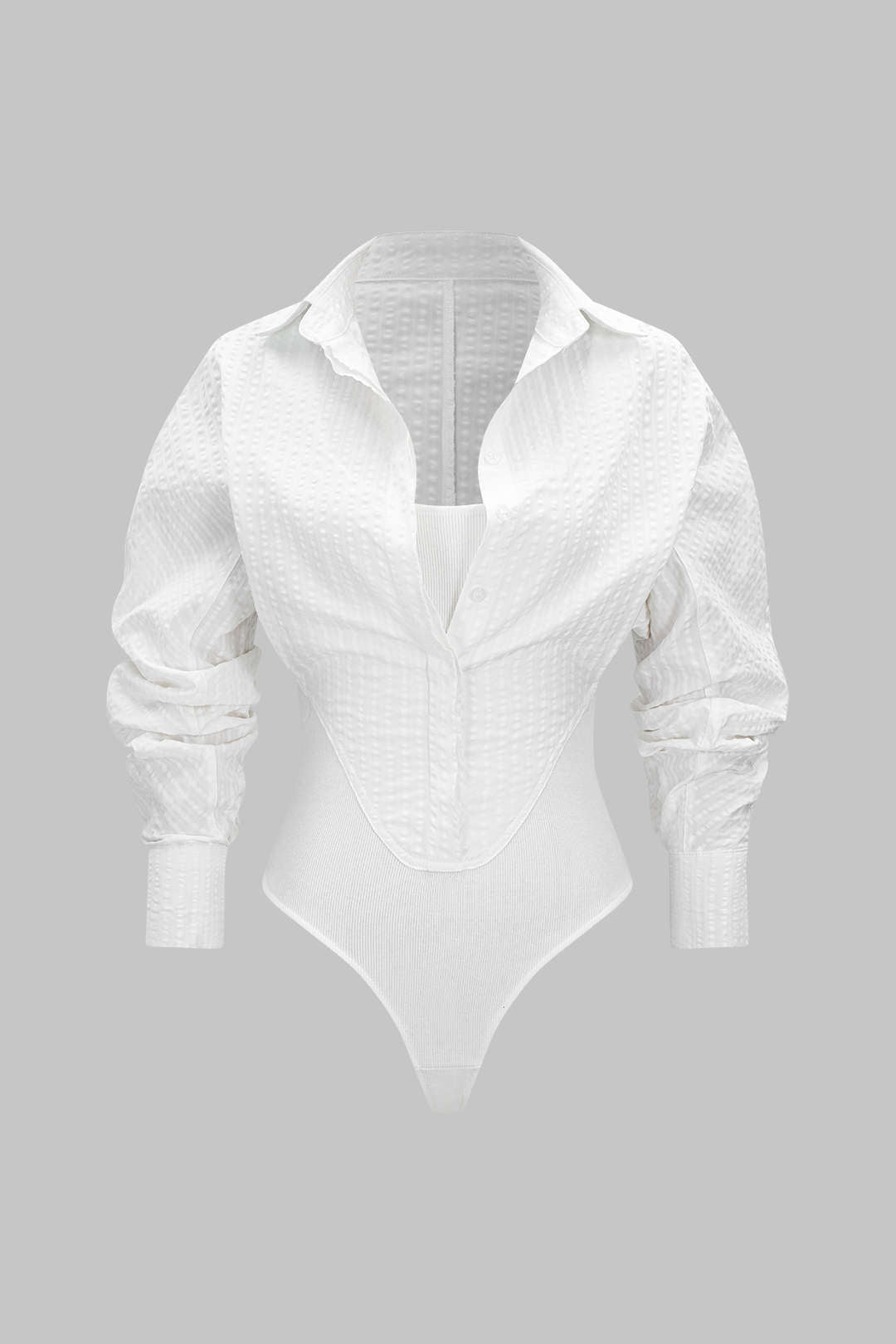 Body met knoopjes, uitsnijding en lange mouwen