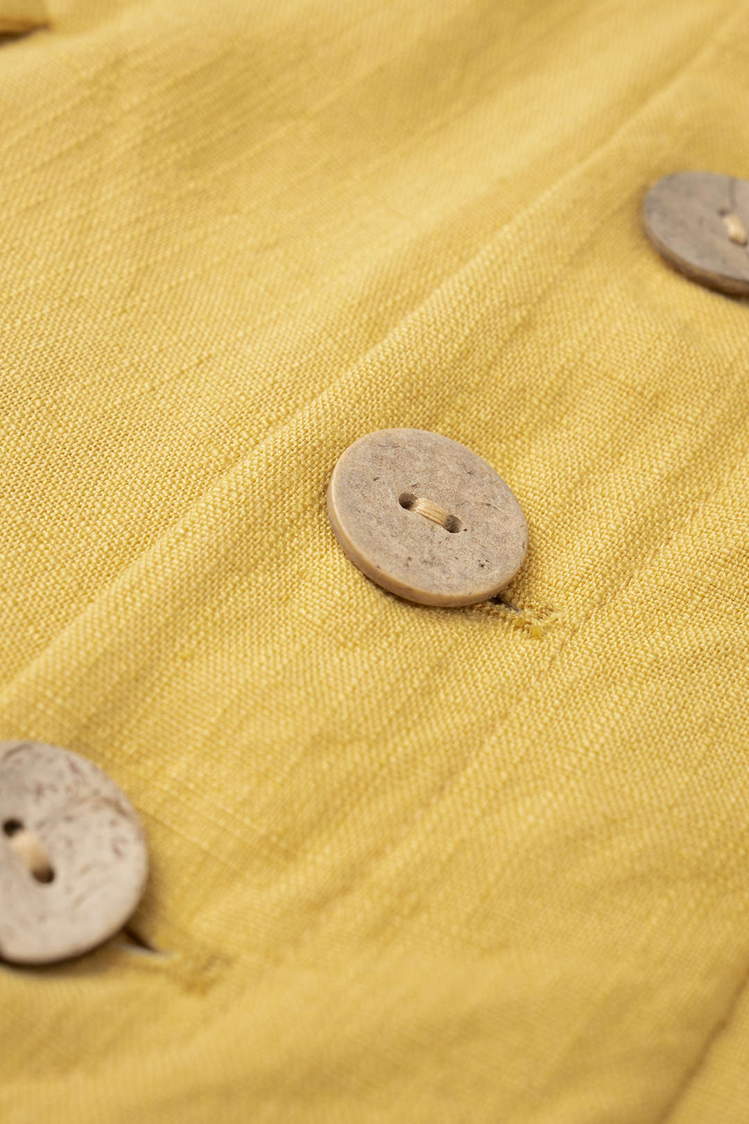 Broek met knoopjes, zakken en strik