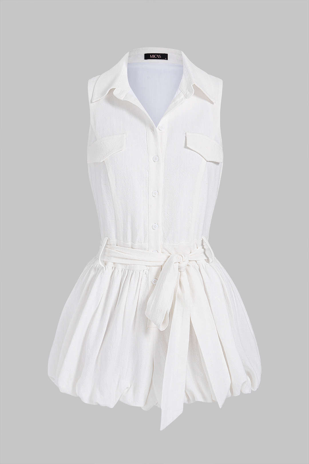 Mouwloze playsuit met ruches en strik