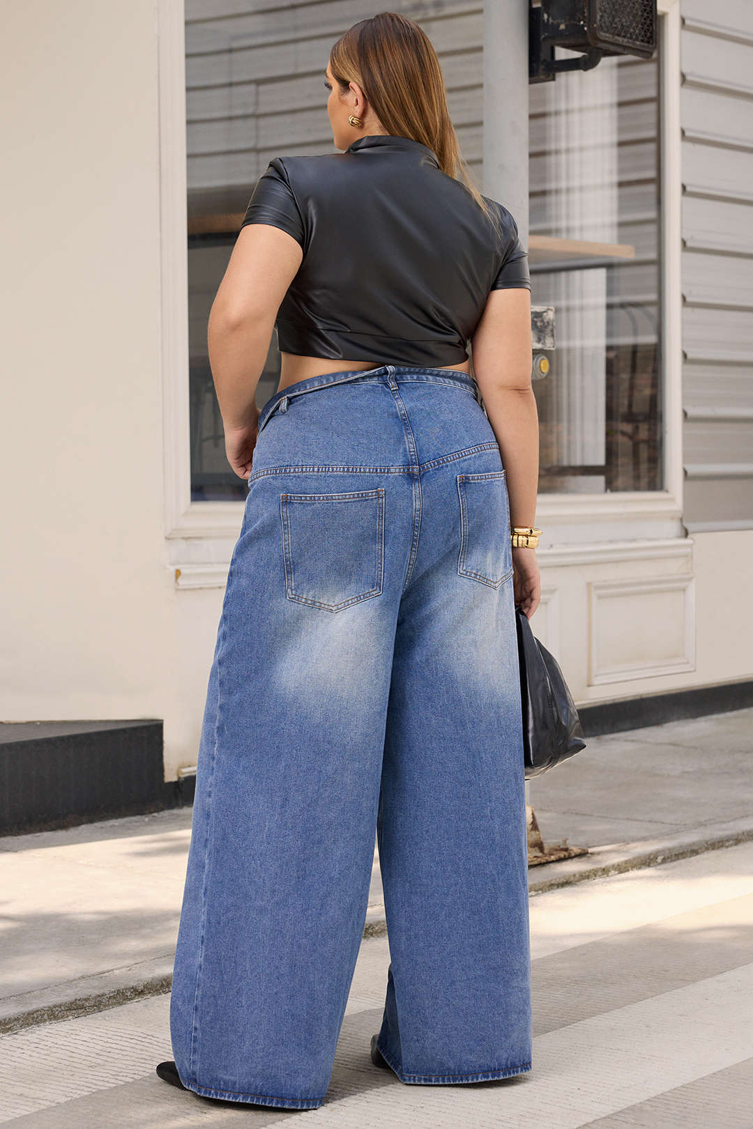 Asymmetrische jeans met hoge taille