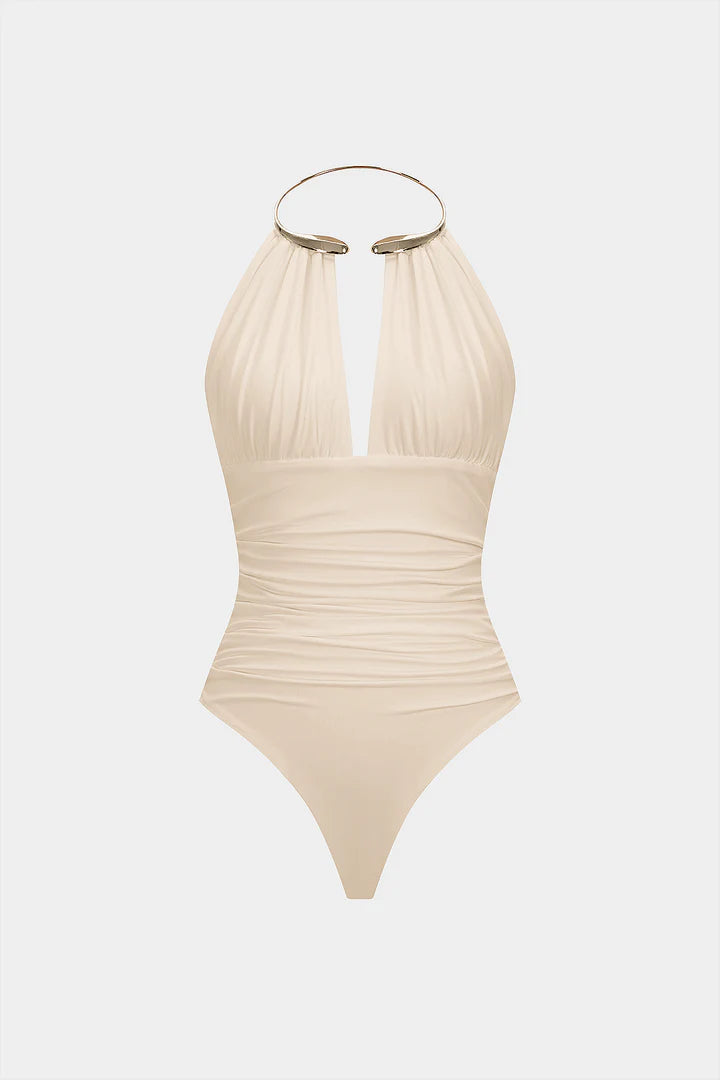 Bodysuit with metallic details, halter neck and open back
