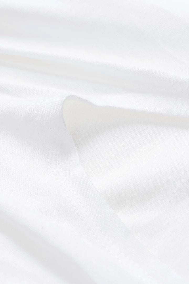 Plain T-shirt with pleats and a bow on the front