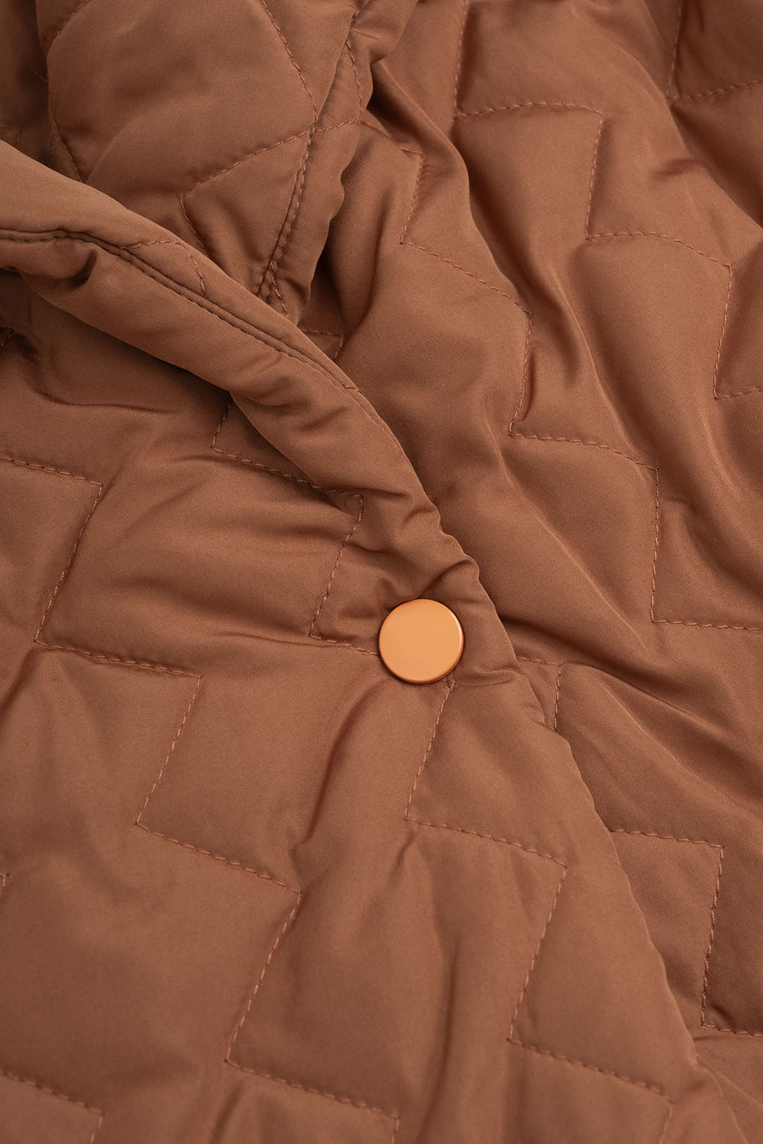 Pufferjas met revers en riem