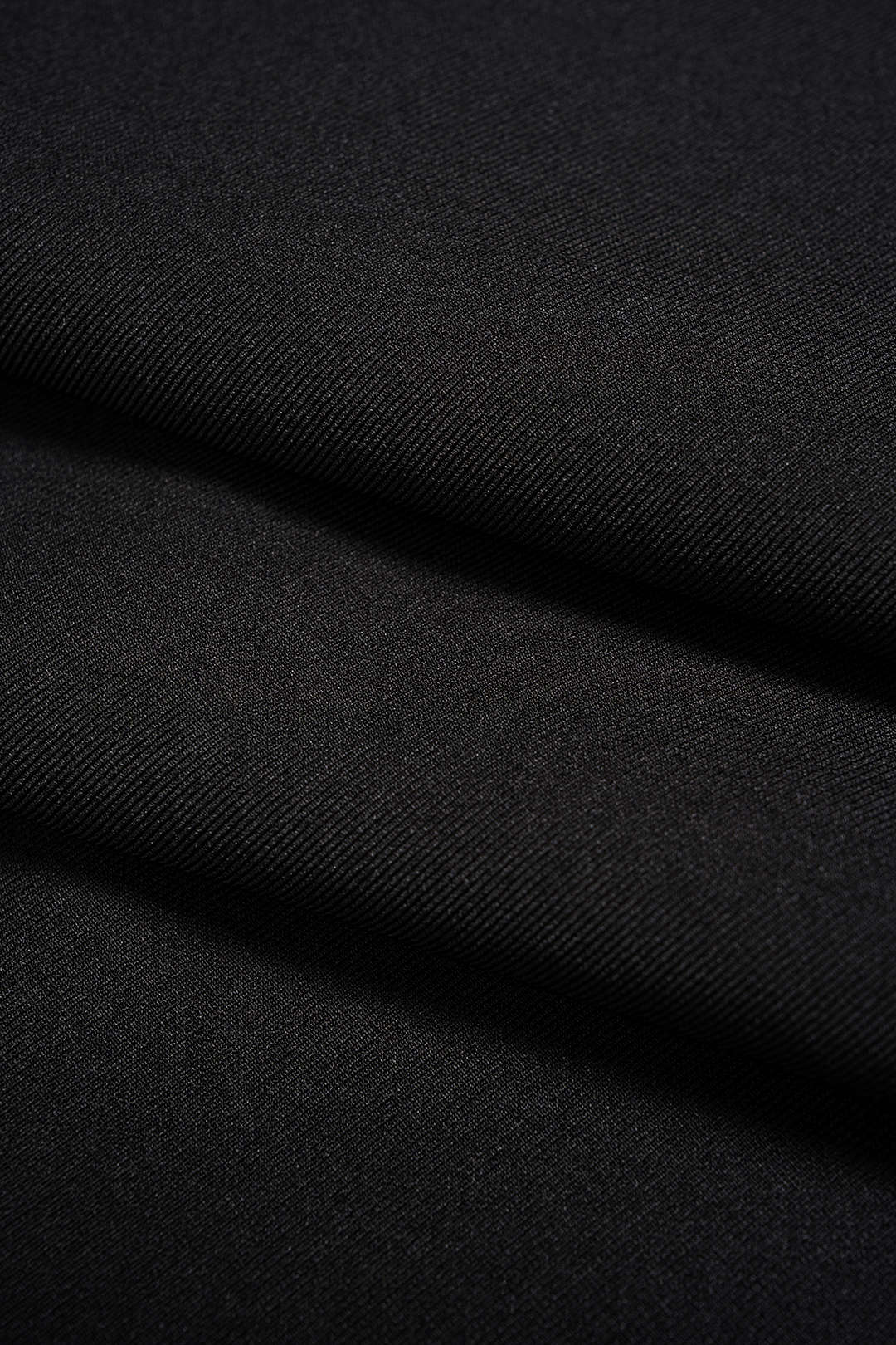 Asymmetrische broek met kanten rand en wijde pijpen