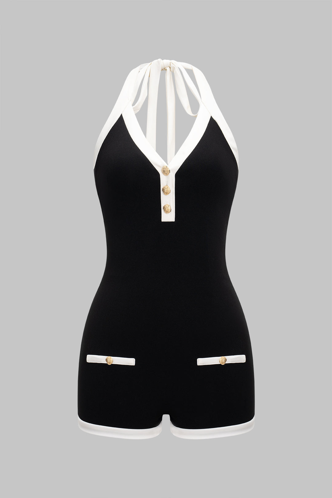 Mouwloze playsuit met halternek, open rug en strik