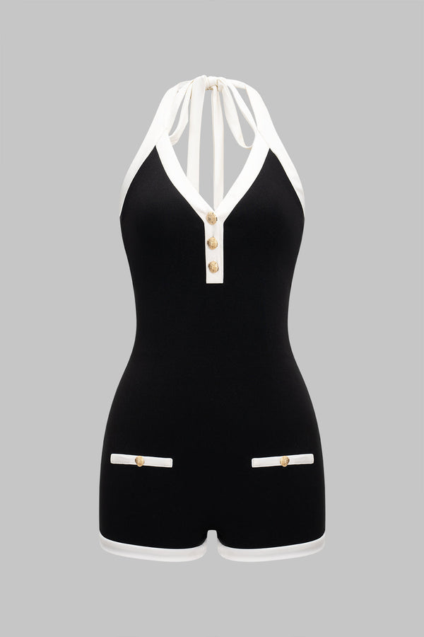 Mouwloze playsuit met halternek, open rug en strik
