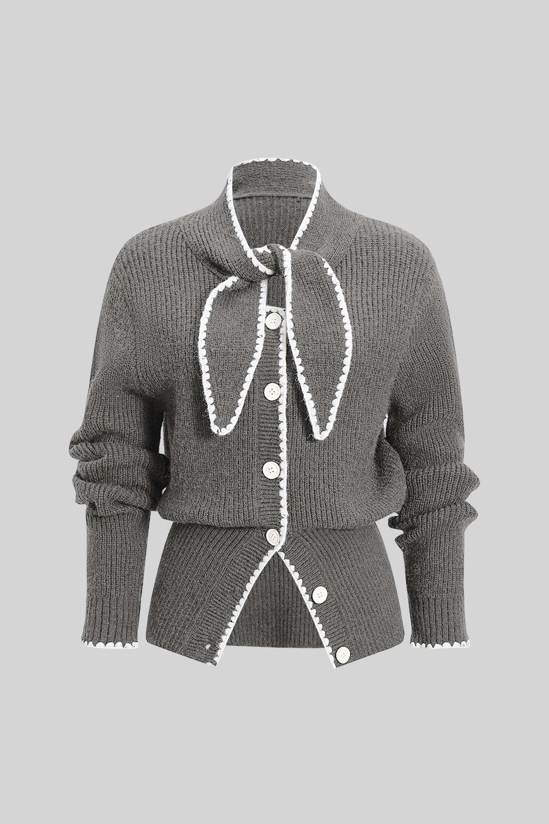 Gebreid vest met knoopjes en strik