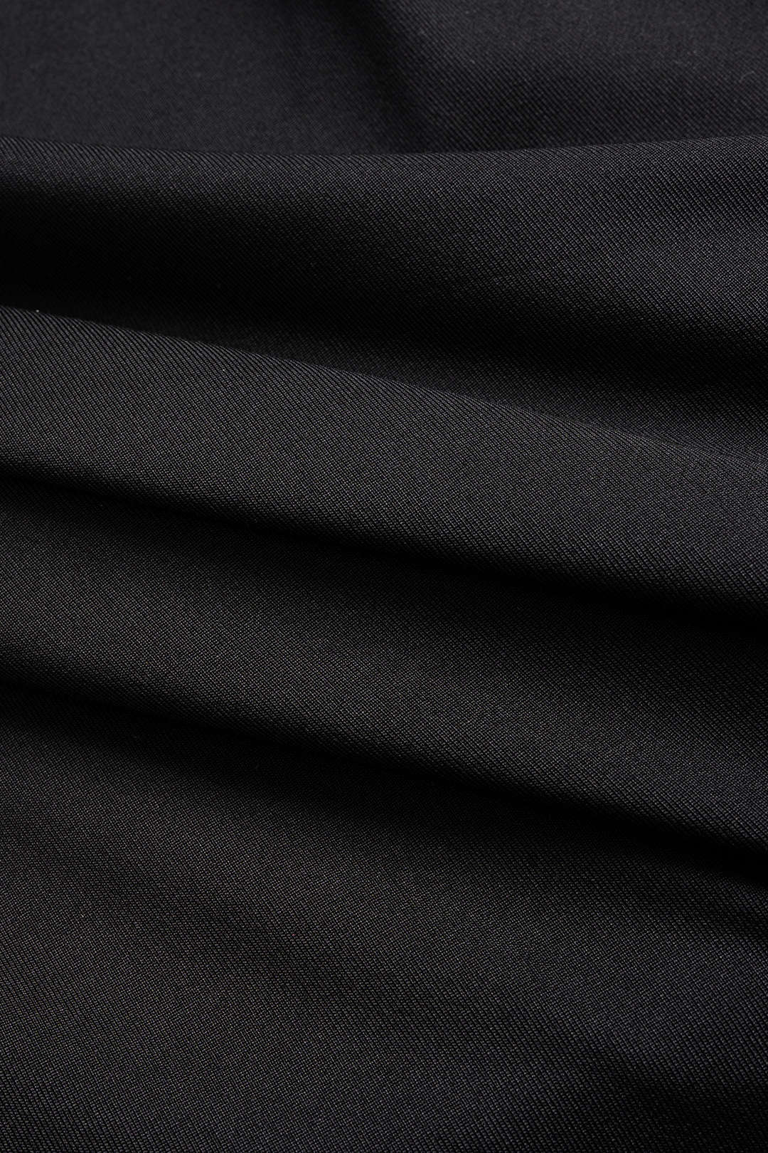 Asymmetrische midijurk met V-hals, ruches en lange mouwen