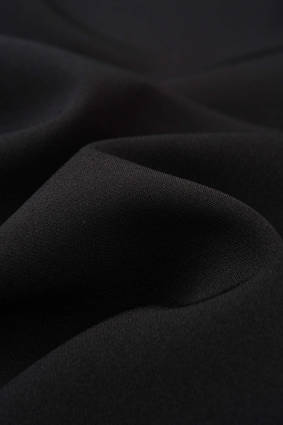 Asymmetrische broek met kanten rand en wijde pijpen