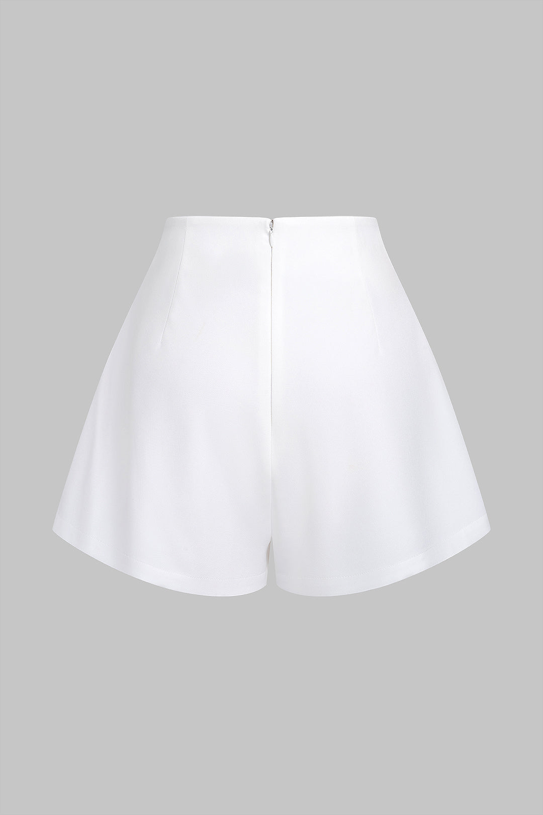 Geometrische short met strik en wijde pijpen