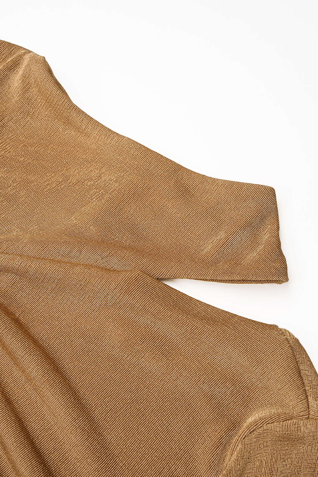 Metallic asymmetrische body met gedraaid detail
