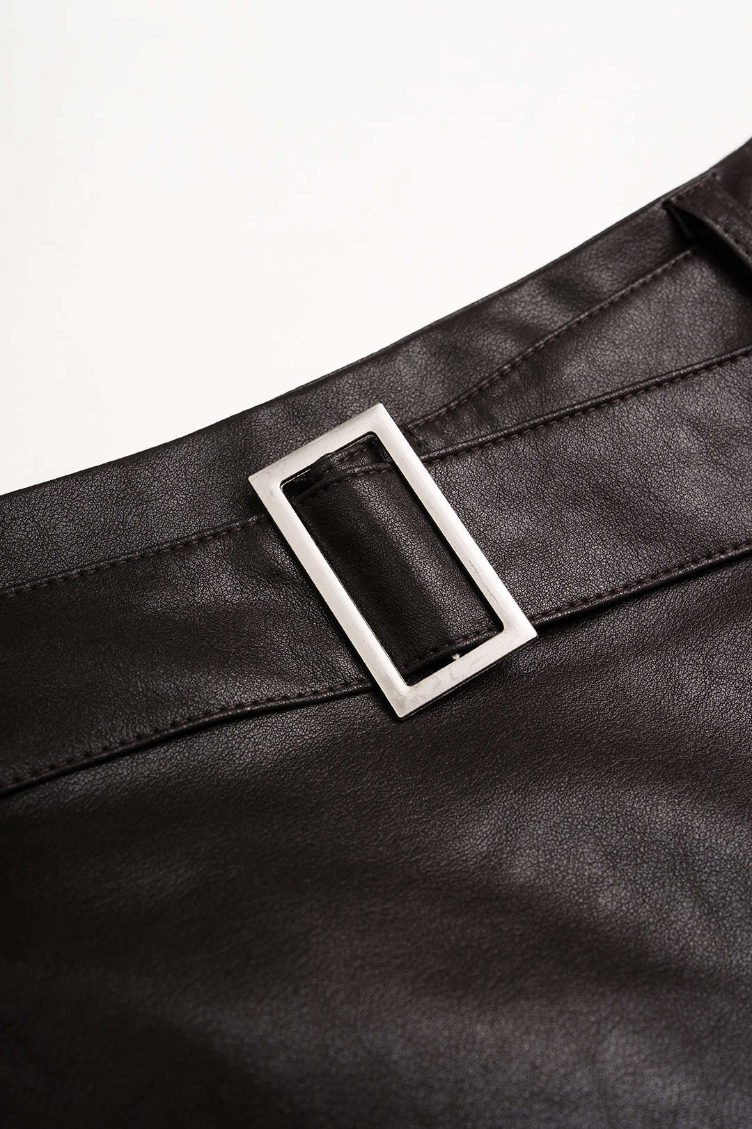 Leren-look patchwork rok met kant en riem