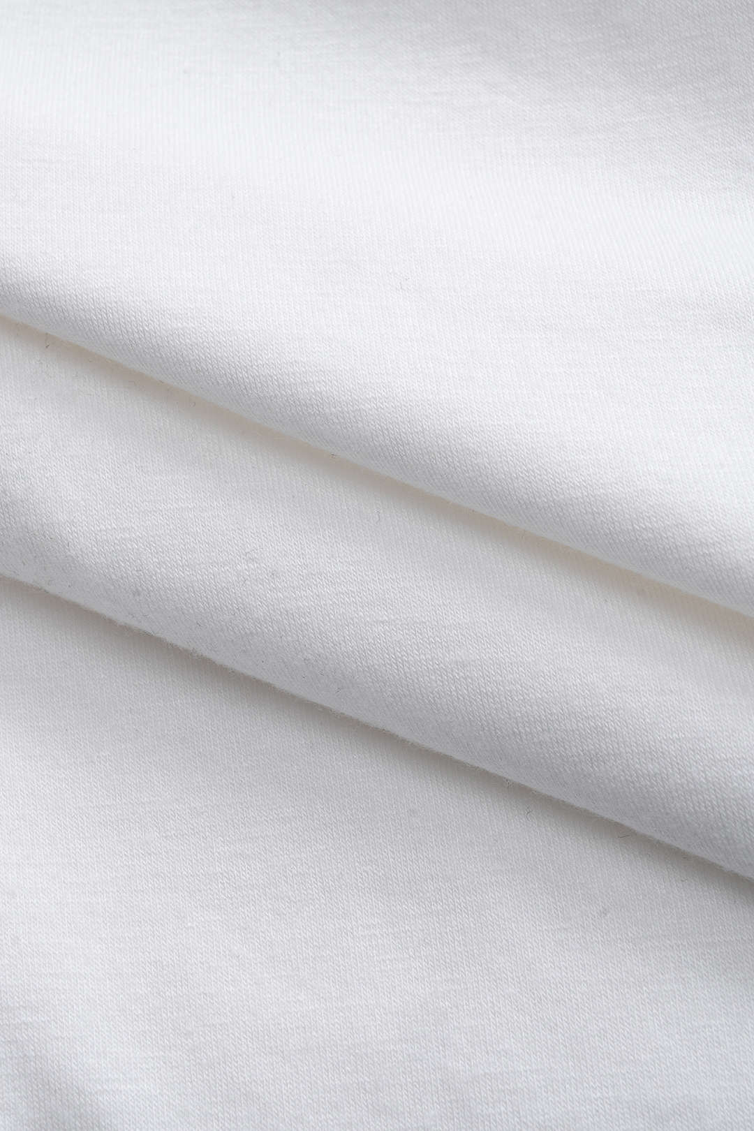 Effen T-shirt met gedraaid detail en ronde hals