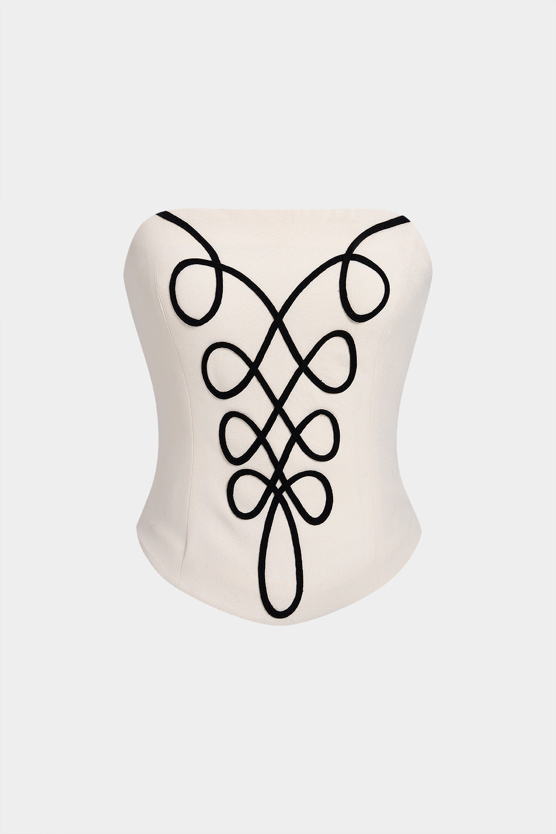 Strapless top met borduursel