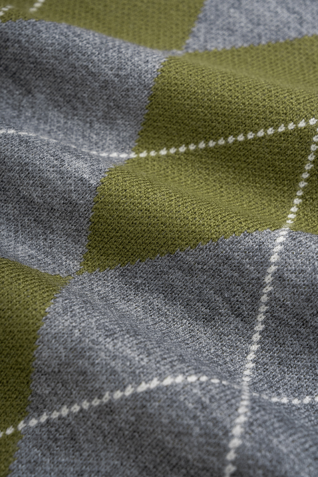 Gebreide geometrische top met revers en lange mouwen