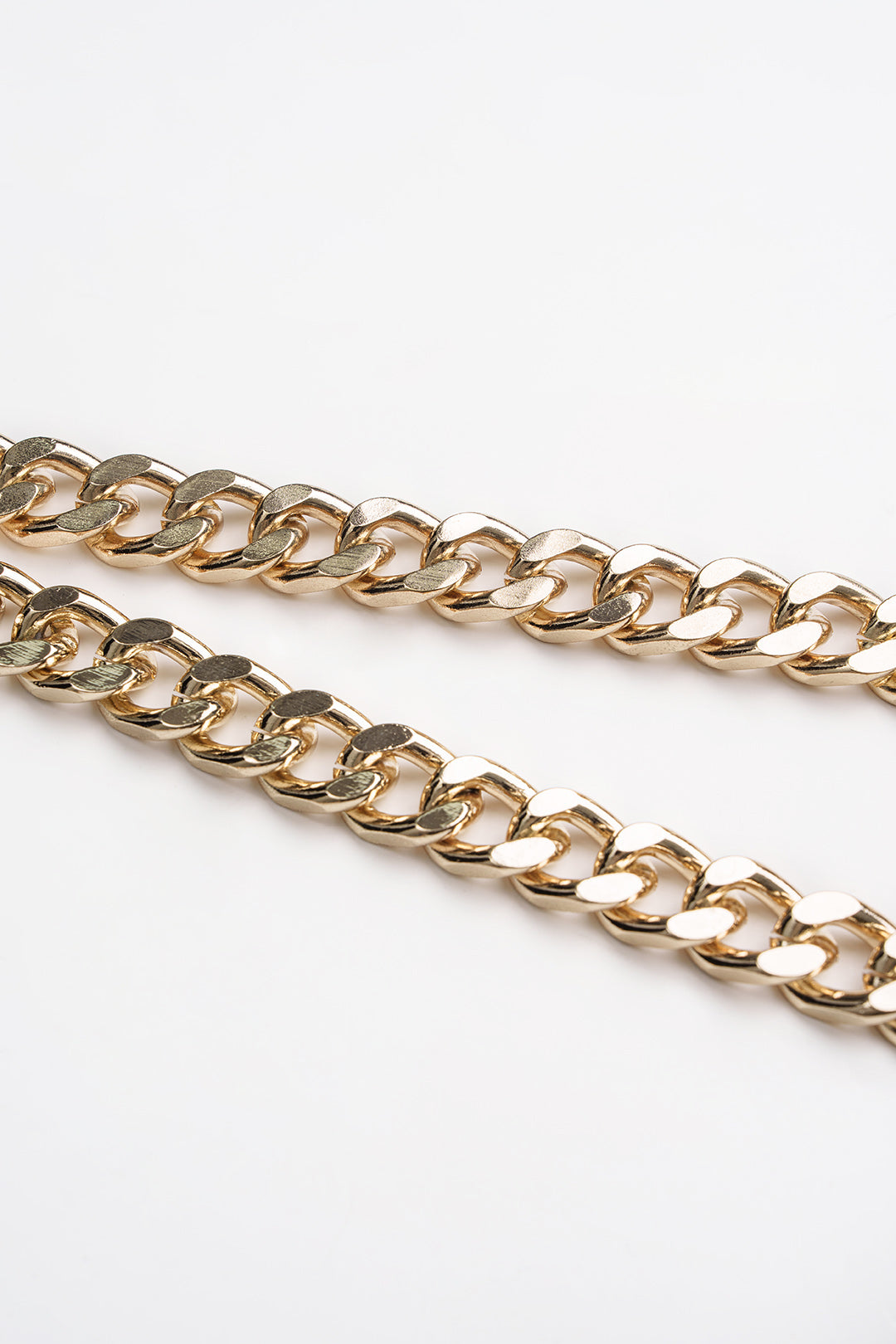 Céline - Metallic top met kettingdetail