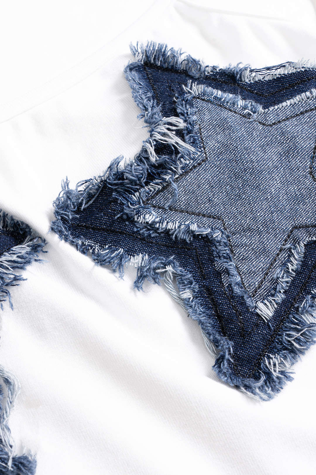 Patchwork mouwloze body