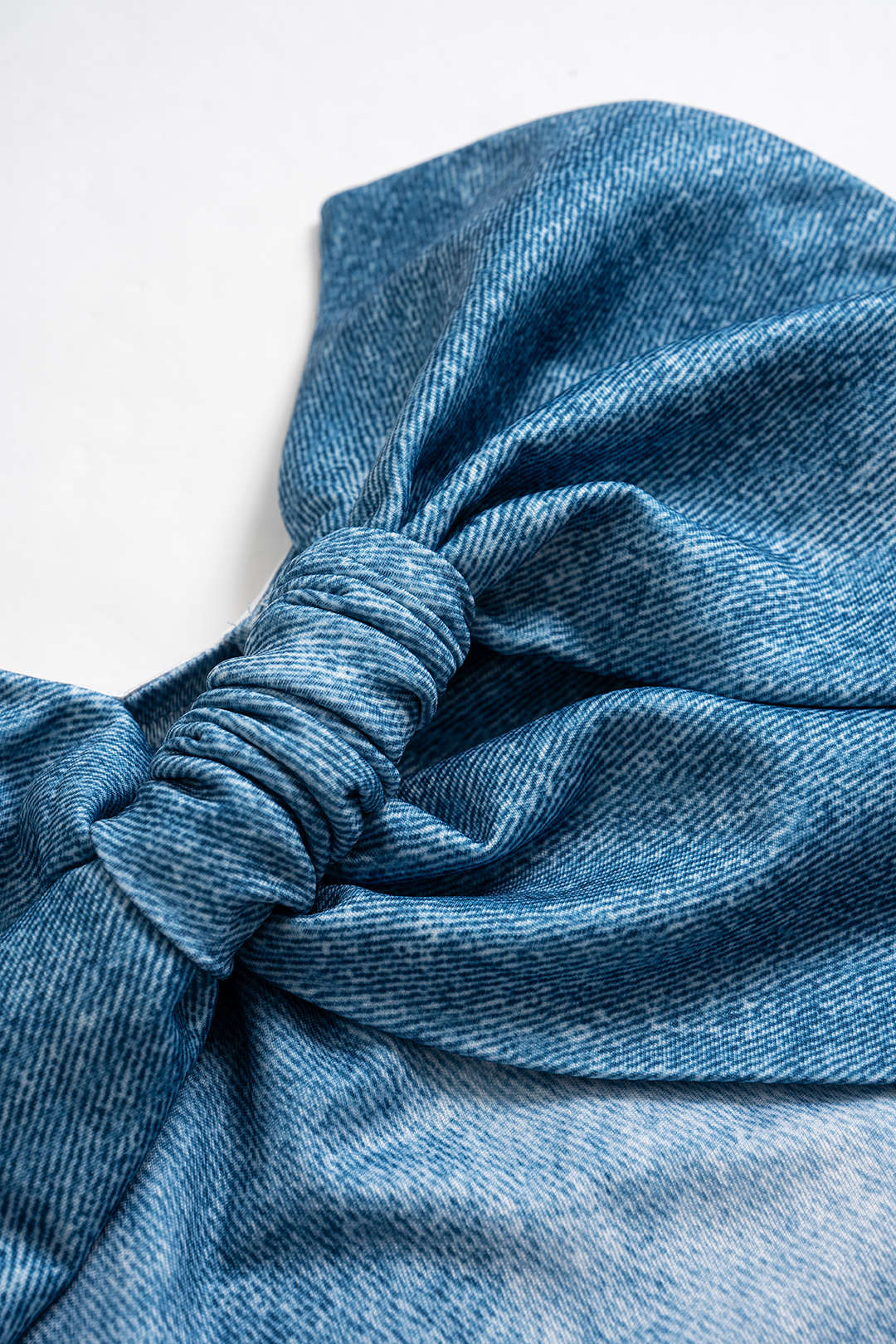 Denim asymmetrische strapless top met gedraaid detail