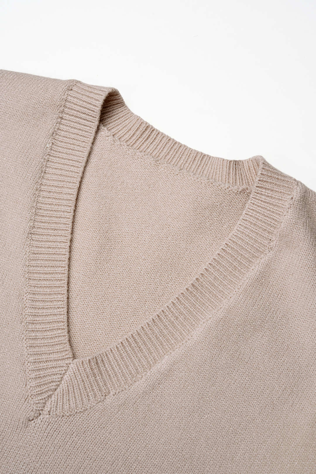 Lara - Gebreide patchwork top met kant, V-hals en lange mouwen