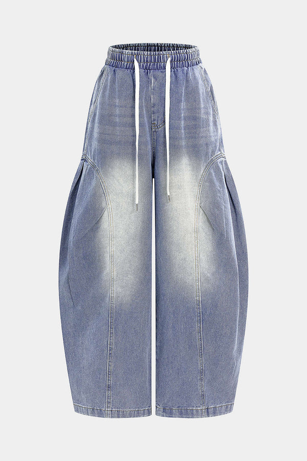 Jeans met trekkoord en smokwerk
