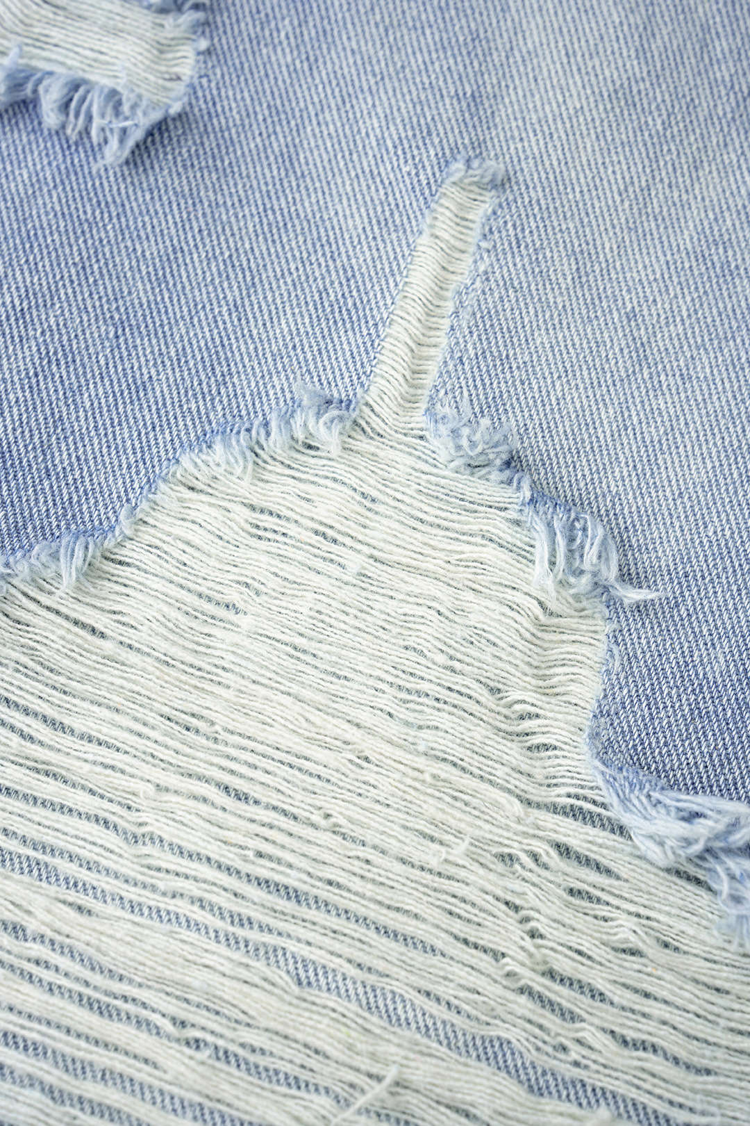 Lina - Ripped jeans met wijde pijpen