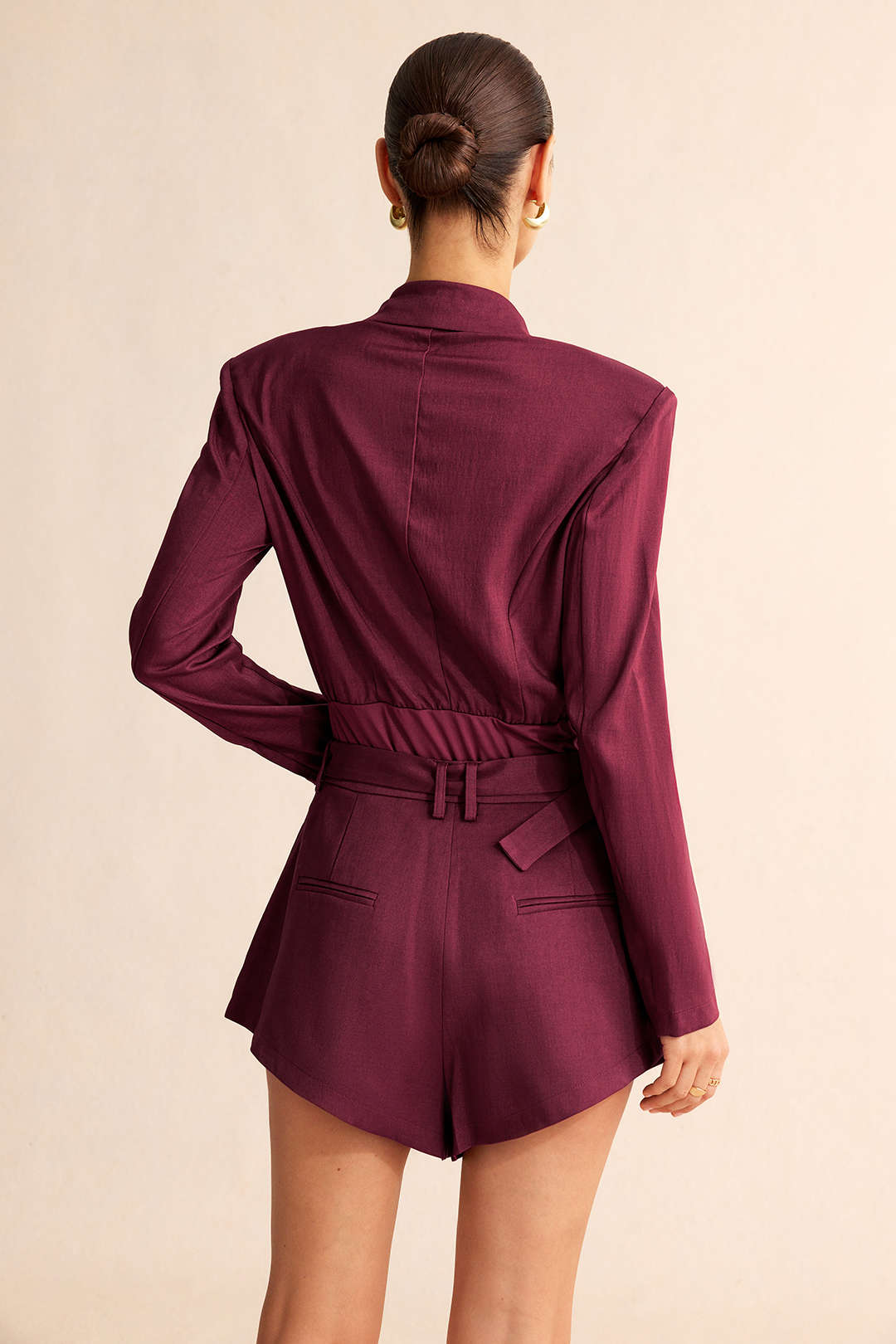 Asymmetrische body met reverskraag en lange mouwen