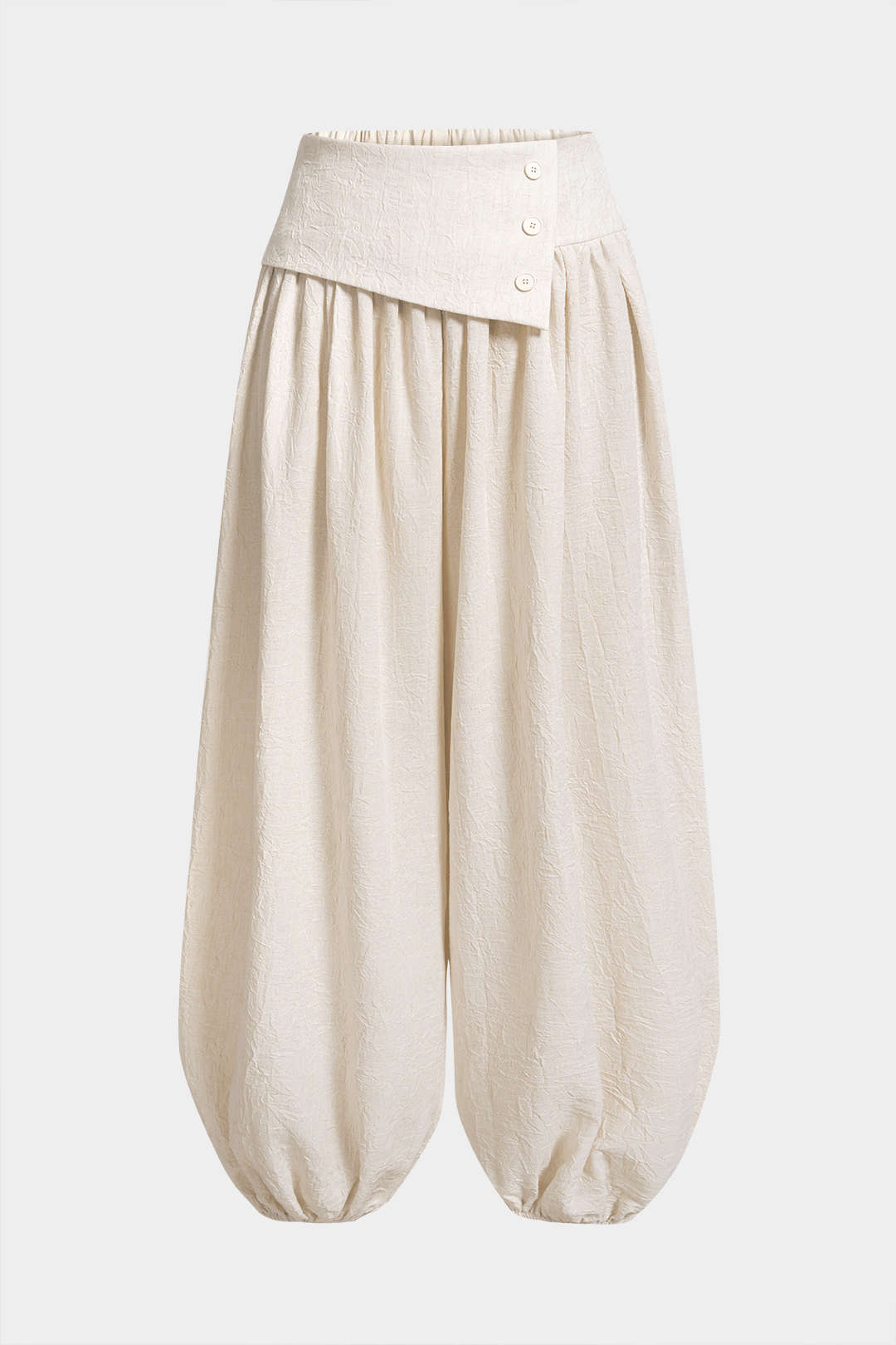 Asymmetrische broek met knoopjes, ruches en wijde pijpen