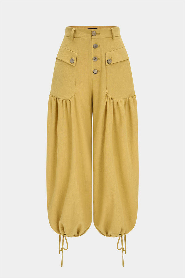 Broek met knoopjes, zakken en strik